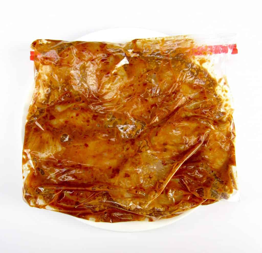 chipotle lime marinade with chicken in food storage bag