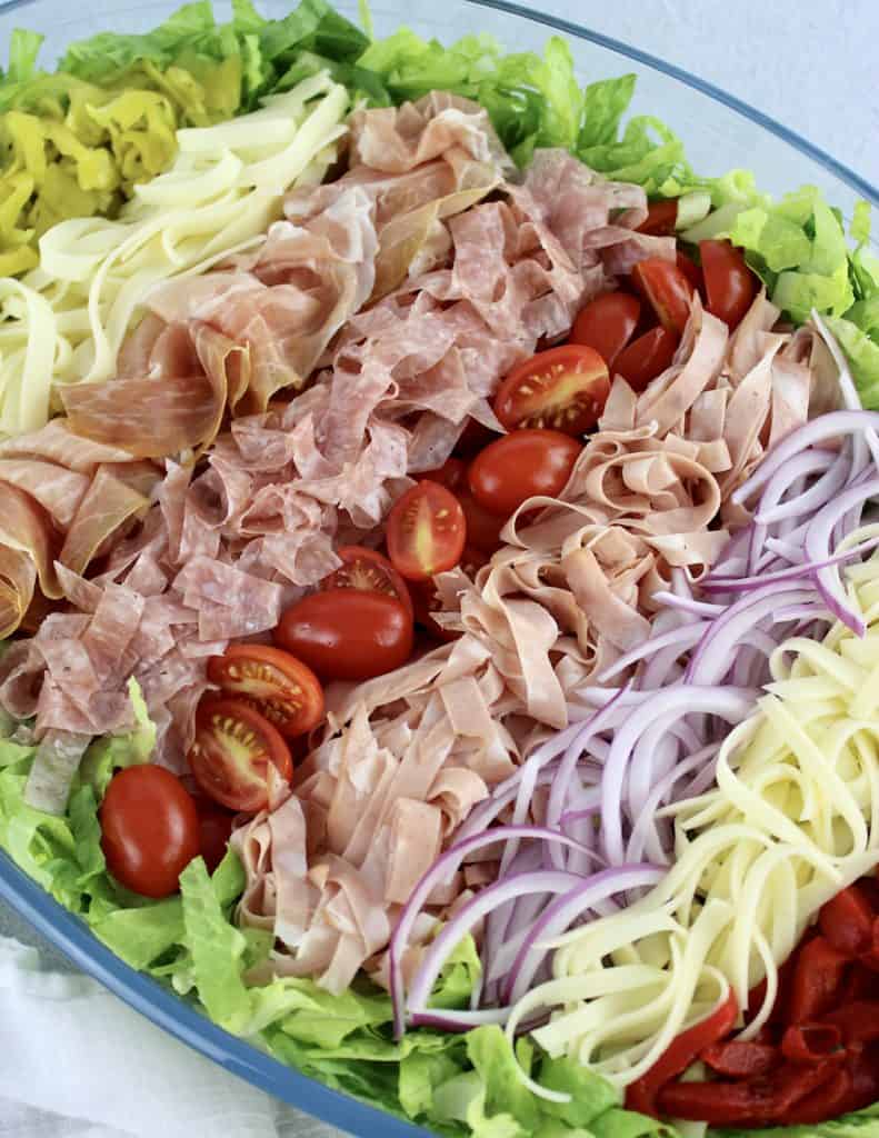 Grinder Salad in oval bowl arranged in rows
