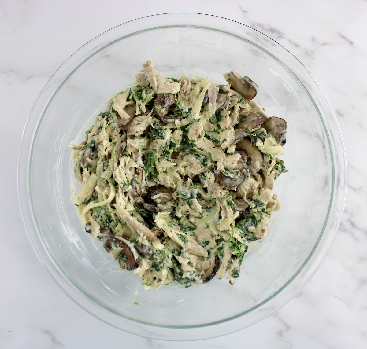 Keto Chicken Florentine Casserole filling in glass bowl